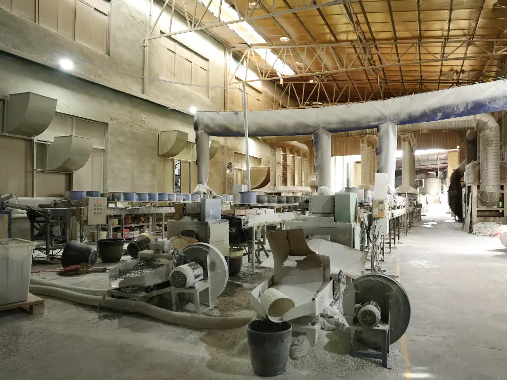 A view of the granulating equipment used for processing raw materials in the factory.